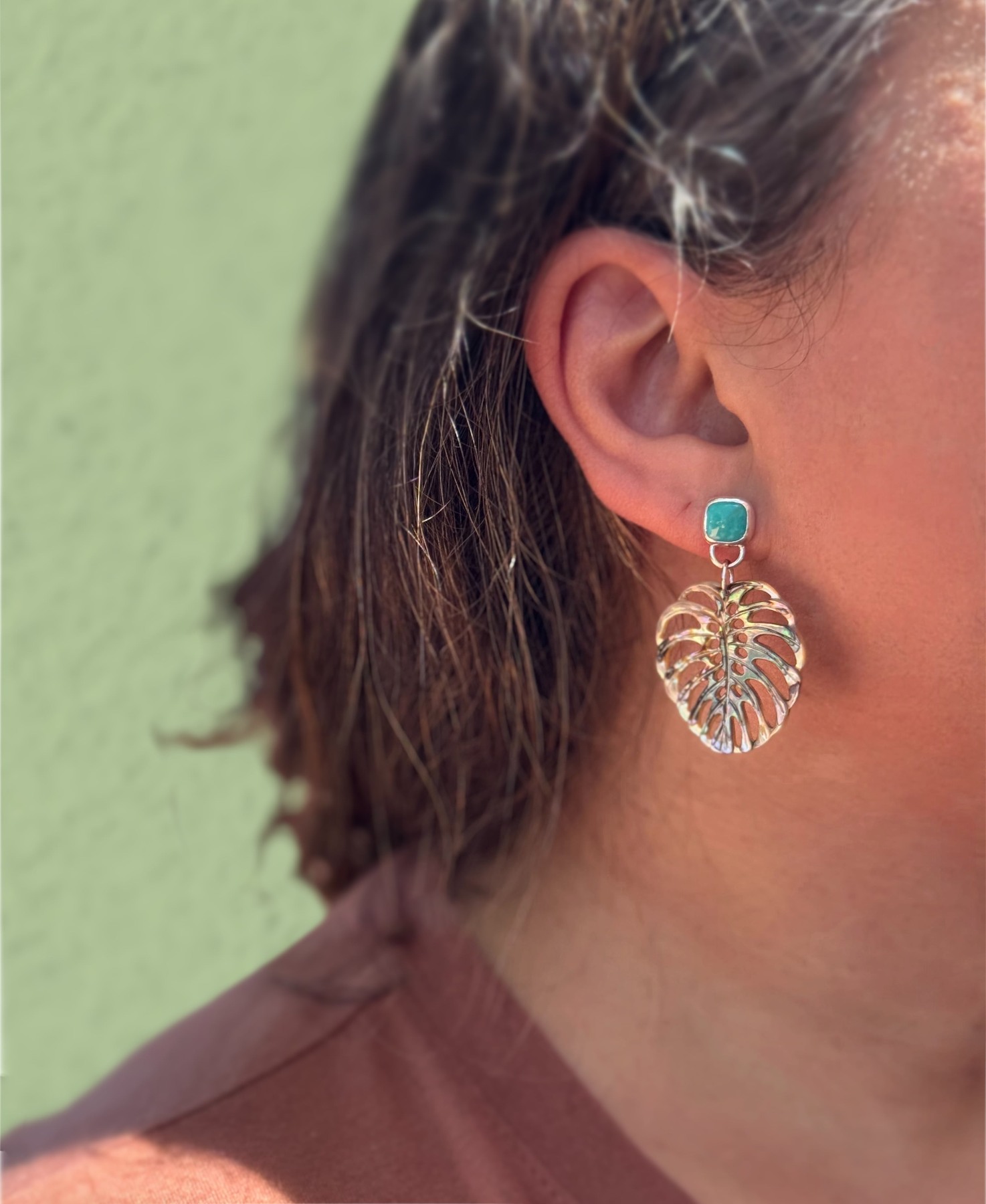 Another view of Turquoise Abalone Monstera Earrings